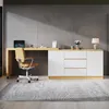 A modern home office setup with a desk, chair, and storage unit against a concrete wall. Produktbild-Vorschau