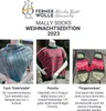 A collage of three knitted items: a blue and gray poncho, a red and green poncho, and a pair of red and green mittens. Text describes the items and the brand. Produktbild-Vorschau