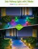 A split image showing solar pathway lights in two different modes: color-changing and warm white, illuminating a garden path and house exterior. Produktbild-Vorschau