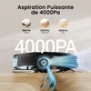 A vacuum robot on a wooden surface, with graphics showing suction power. Voir les images du produit