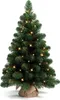 A small artificial Christmas tree with LED lights, standing in a burlap pot. Náhled obrázku produktu