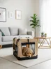 A golden retriever puppy is inside a beige and black soft dog crate in a living room setting. Produktbild-Vorschau