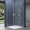A modern corner shower cabin with glass doors and silver fixtures, set against a blue wall and a view of a garden through a large window. Produktbild-Vorschau