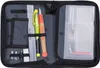 An open pencil case with various stationery items inside. Náhled obrázku produktu