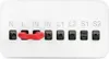 A close-up view of a white electrical relay switch with terminals labeled N, L, IN, IN, L1, L2, S1, S2. A red jumper is connecting two terminals. Náhľad obrázku produktu
