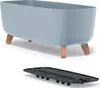A light gray planter with brown legs is shown, along with a black insert tray. Náhľad obrázku produktu