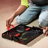 A person is kneeling on the floor and interacting with a Beyblade stadium. Anteprima dell’immagine prodotto