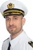A man wearing a captain's uniform and hat. Produktbild-Vorschau