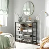 A bedroom scene with a shoe rack and a bed. Náhled obrázku produktu