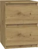 A close-up view of a wooden bedside table with two drawers.