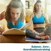 A split image showing a woman performing exercises on a balance board, with text at the bottom. Produktbild-Vorschau