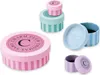 Several small, round gift boxes with striped patterns and branded lids are arranged on a white background. Anteprima dell’immagine prodotto