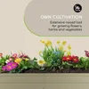 A raised garden bed filled with colorful flowers and plants, with text overlay describing its use. Podgląd zdjęcia produktu