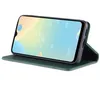 A green leather flip case for a smartphone is shown in a studio setting. Produktbild-Vorschau