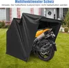 A black motorcycle cover with a metal frame is shown covering a yellow motorcycle parked on a green lawn in front of a house. Anteprima dell’immagine prodotto