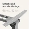 Close-up of a gray metal desk frame with text overlays indicating easy and fast assembly. Produktbild-Vorschau