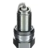 A close-up, studio shot of a single spark plug against a white background. Produktbild-Vorschau