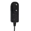 A close-up view of a black AC/DC adapter with visible text and regulatory markings. Produktbild-Vorschau