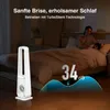 A woman and child sleeping in bed, with a tower fan in the foreground and a sound wave graphic. Voir les images du produit
