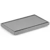 A gray fabric ottoman or storage bench on a white background. Podgląd zdjęcia produktu