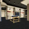 A well-lit retail store interior with clothing racks, shelves, and display tables. Náhled obrázku produktu