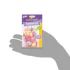 A hand is holding a package of macaron decorations. Náhled obrázku produktu