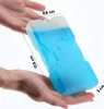 Hands holding a blue ice pack with dimensions indicated by text. Podgląd zdjęcia produktu