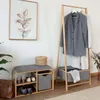 A hallway scene with a clothing rack and shoe bench. Anteprima dell’immagine prodotto