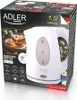 The image shows the packaging of an Adler electric kettle, with the kettle itself partially visible. Voir les images du produit