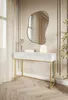 A modern white console table with gold legs is placed in a well-lit room with neutral-toned walls and curtains. Anteprima dell’immagine prodotto