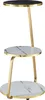 A three-tiered side table with marble-effect tops and gold-colored legs. Voir les images du produit