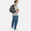 A man wearing a backpack. Produktbild-Vorschau
