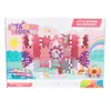The image shows the packaging of a building block set, featuring a pink castle with various figures and elements, including a princess, a horse-drawn carriage, and a dragon. Podgląd zdjęcia produktu