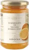 A jar of orange marmalade on a white background. Produktbild-Vorschau