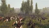 A large-scale battle scene from Mount & Blade II: Bannerlord, featuring numerous cavalry units charging through a grassy field with trees in the background. Náhľad obrázku produktu