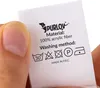 A hand holding a clothing care label with washing instructions. Náhľad obrázku produktu