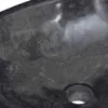 A close-up view of the interior of a dark-colored sink, showing the drain. Produktbild-Vorschau