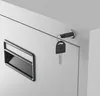 A close-up view of a filing cabinet drawer handle and lock with a key inserted. Anteprima dell’immagine prodotto