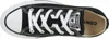 A top-down view of a black Converse All Star sneaker with white laces. Voir les images du produit