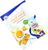 A marketing image for fruit spreads and desserts, featuring a recipe booklet and a packet of 'Gelier Zauber'. Produktbild-Vorschau