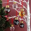 Christmas tree ornaments shaped like small glass bottles filled with colored liquids, hanging on a white decorative tree branch next to a Christmas tree. Anteprima dell’immagine prodotto