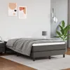 A bedroom setting with a bed. Voir les images du produit