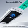 A close-up view of a phone screen protector being installed using an applicator tool. Náhľad obrázku produktu