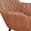 Close-up of a brown leather armchair. Produktbild-Vorschau