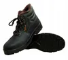 A pair of black work boots with brown fur lining and brown laces, shown against a white background. One boot is upright, and the sole of the other boot is visible. Náhľad obrázku produktu