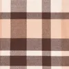 A close-up view of a plaid blanket. Náhled obrázku produktu