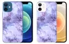 Two iPhone cases with a marble pattern are displayed next to iPhones. Produktbild-Vorschau