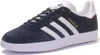 A single navy blue Adidas Gazelle sneaker with white stripes and white sole, shown from a side angle against a white background. Produktbild-Vorschau
