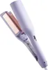 A close-up, angled shot of a purple hair straightener against a white background. Produktbild-Vorschau