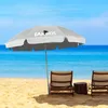 A beach scene with chairs and an umbrella. Náhled obrázku produktu